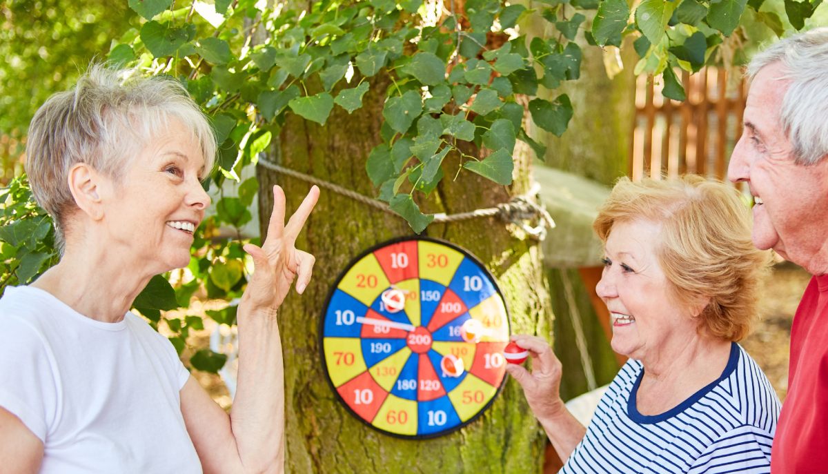 Tech Ridge Oaks | Seniors playing dart game