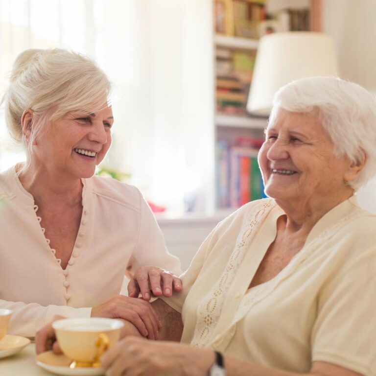 Tech Ridge Oaks | Senior woman smiling with caregiver