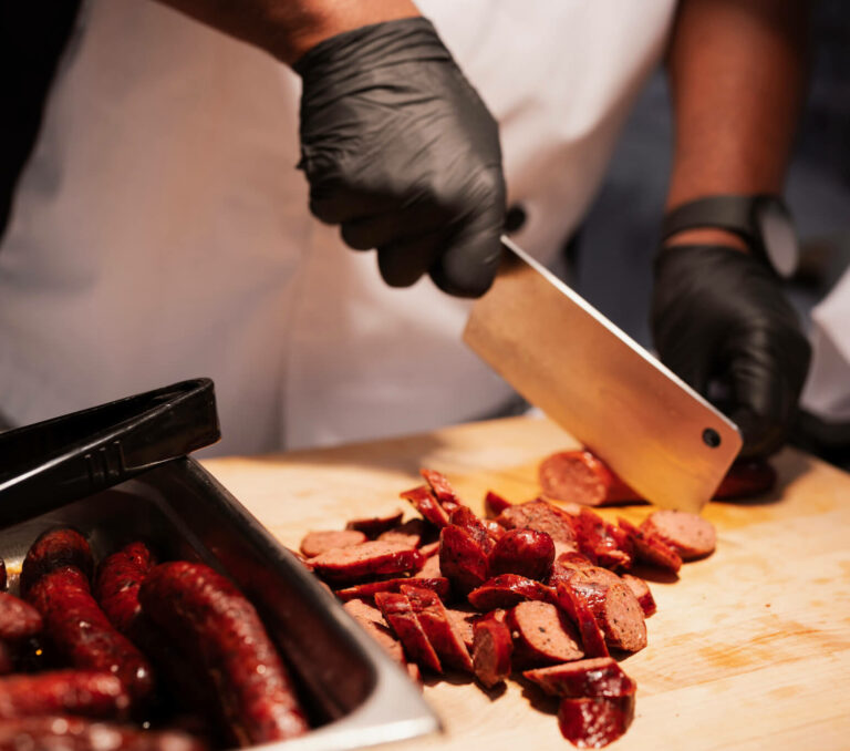 Tech Ridge Oaks | Chef cutting meat