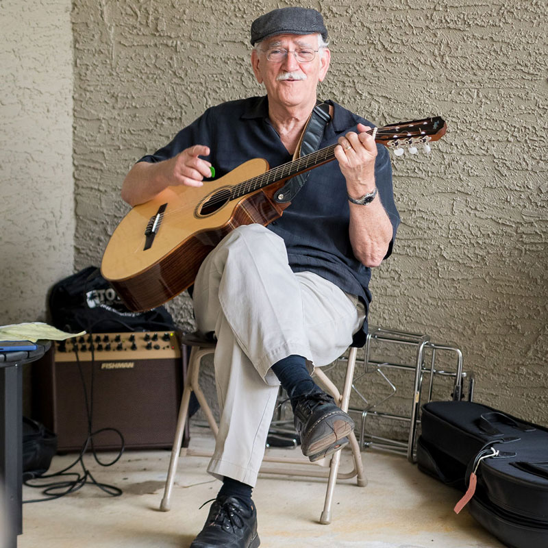 Tech Ridge Oaks | Senior playing guitar