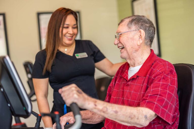 Tech Ridge Oaks | Resident exercising with caregiver