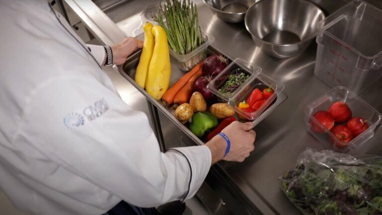 Tech Ridge Oaks | Chef preparing vegetables for senior meals