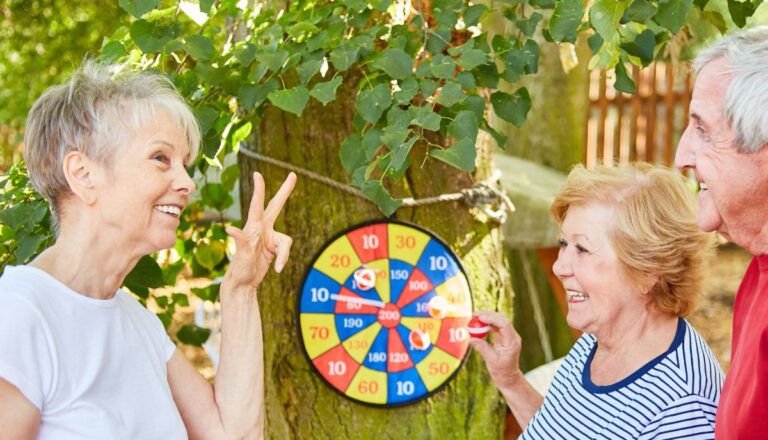 Tech Ridge Oaks | Seniors playing dart game