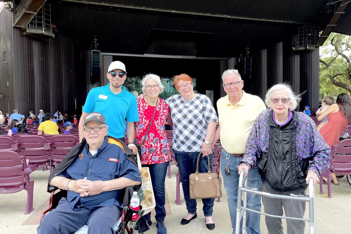 The Avenues of Forth Bend | Christopher with seniors at a concert