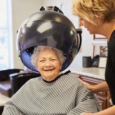 The Avenues of Fort Bend | Senior woman getting her hair done