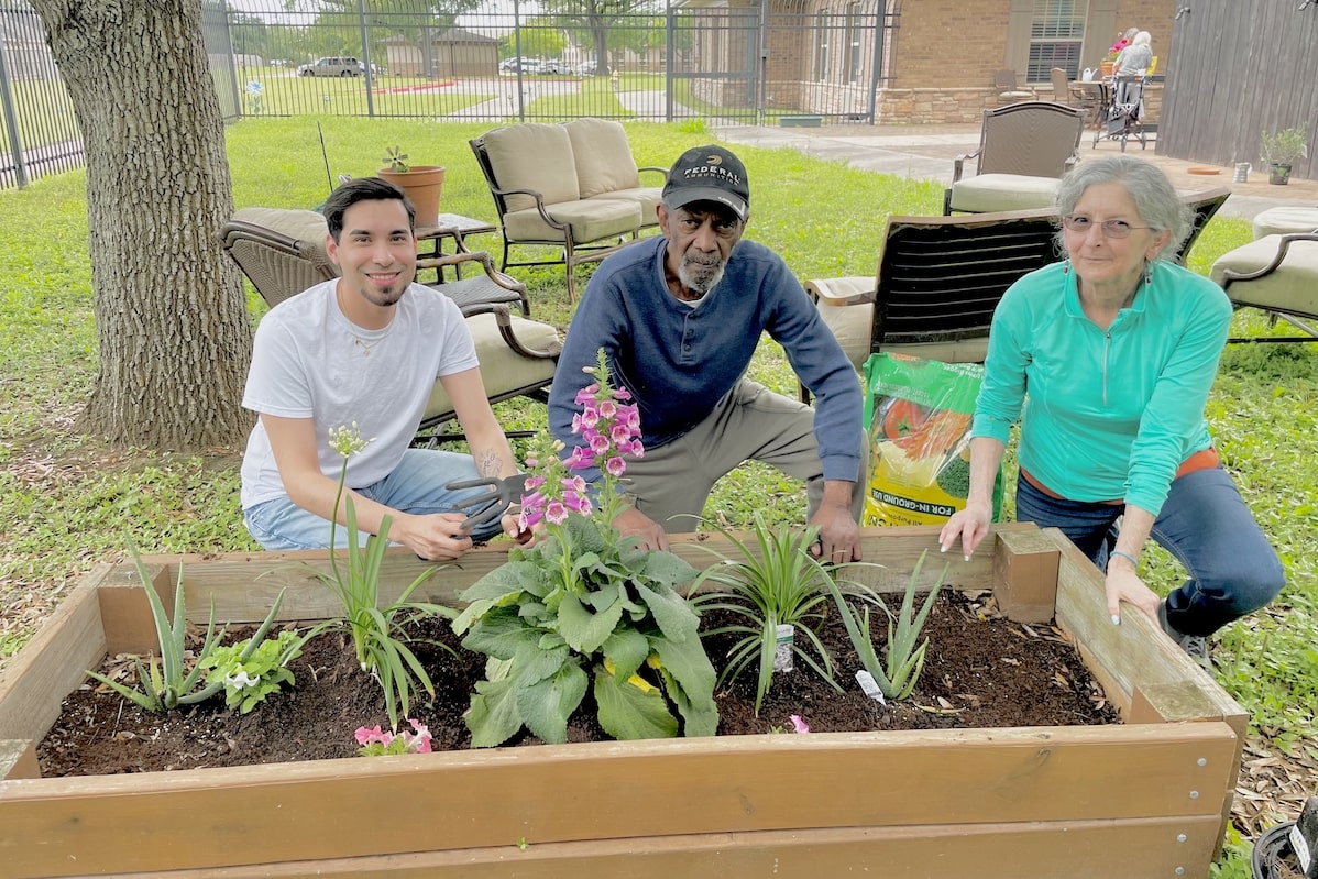 The Avenues of Forth Bend | Christopher gardening with seniors