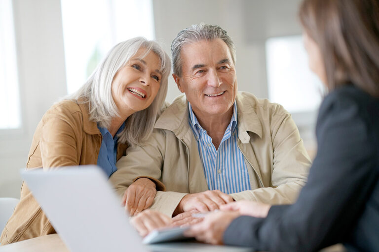 Civitas Senior Living | Senior couple meeting financial adviser for investment