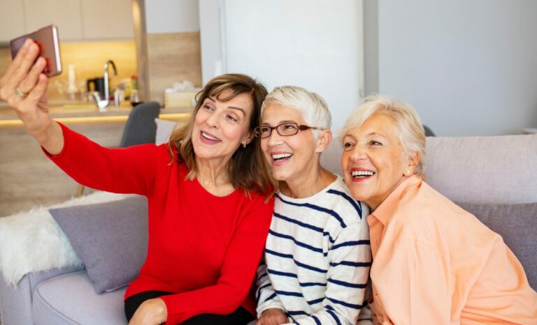 Avenues of Fort Bend | Smiling seniors taking a photo