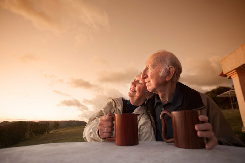 The Bluffs of Flagstaff | Happy senior couple outside at sunset