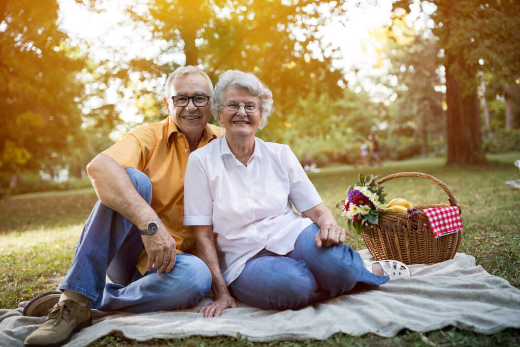 The Brooks of Cibolo | Senior couple enjoying a picnic at the park