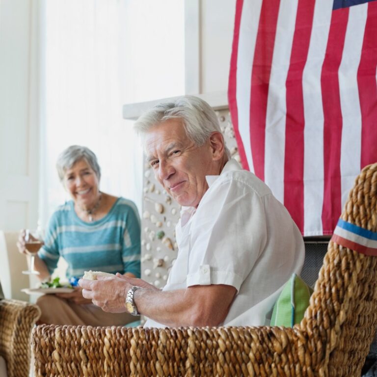 The Brooks of Cibolo | Senior couple with American flag