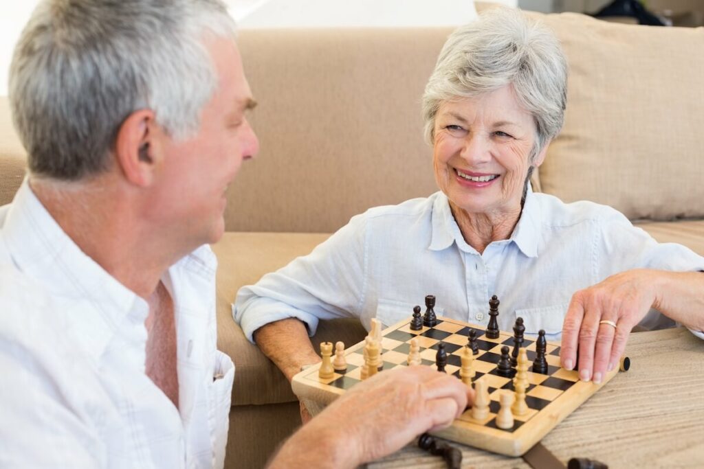 Civitas Senior Living | Senior couple playing chess