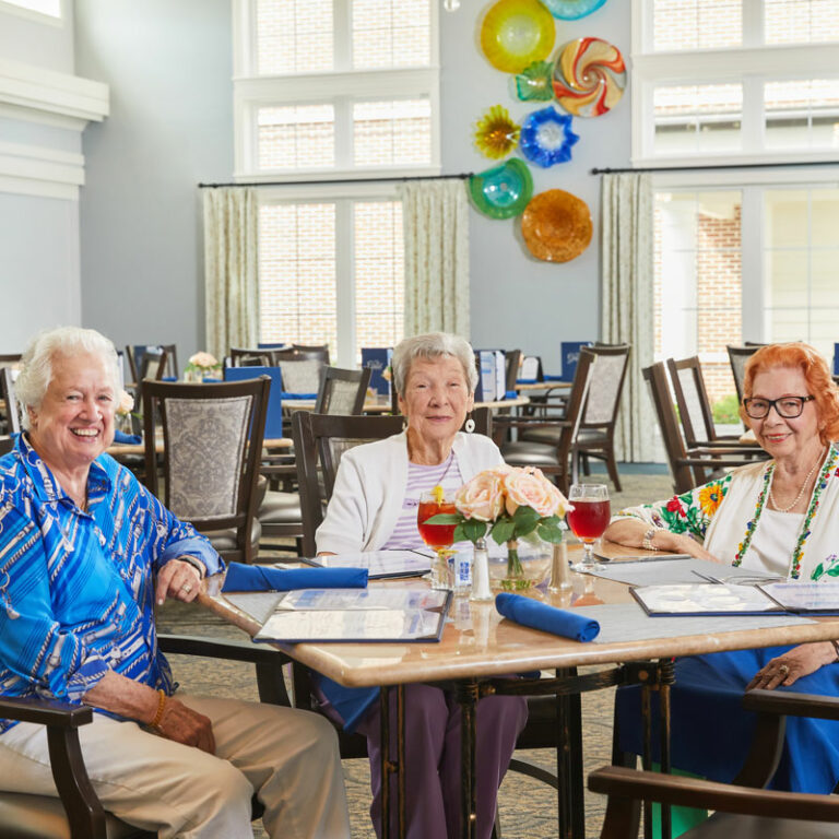 The Grand Senior Living | Senior women at dining table