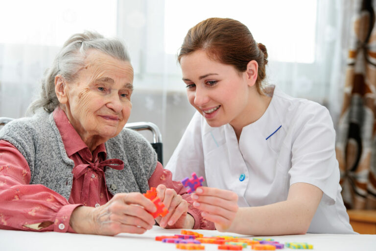 The Grand Louisville | Senior woman making a puzzle