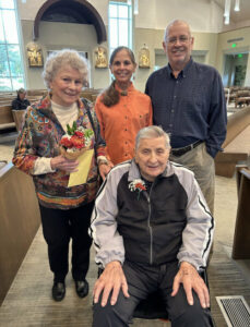 The Grand Senior Living | Couple and their family commemorating their 70th wedding anniversary