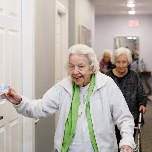 Civitas Senior Living | Residents walking through the hall of a senior living community