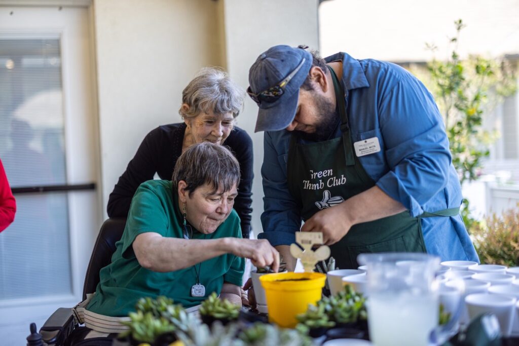 The Grandview of Chisholm Trail | Community members gardening