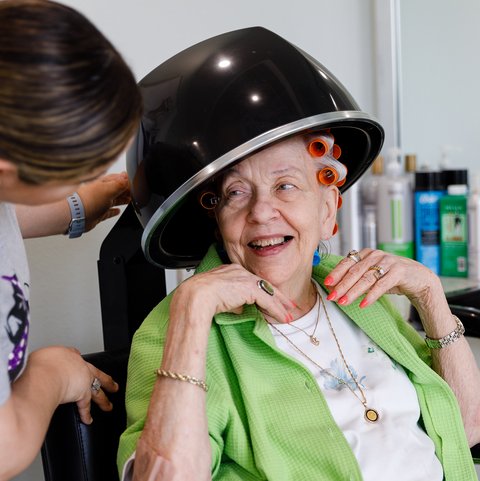 The Ridglea | Senior woman getting her hair done