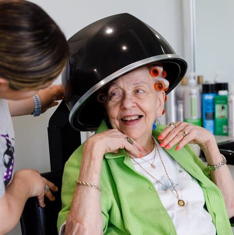 The Ridglea | Senior woman getting her hair done