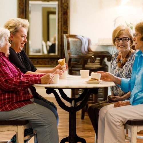 Civitas Senior Living | Seniors talking at a table