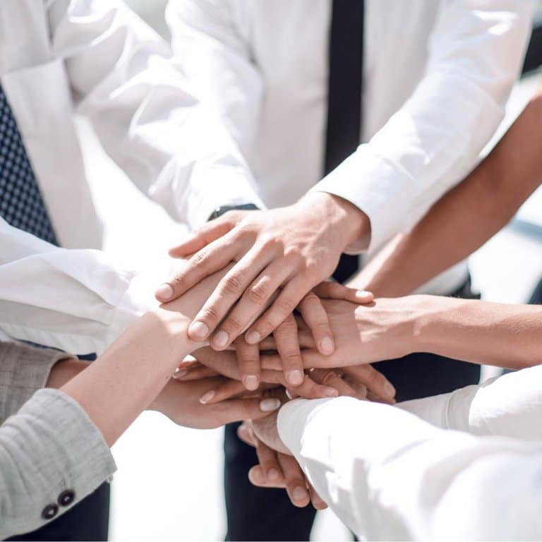 Civitas Senior Living | People putting their hands together