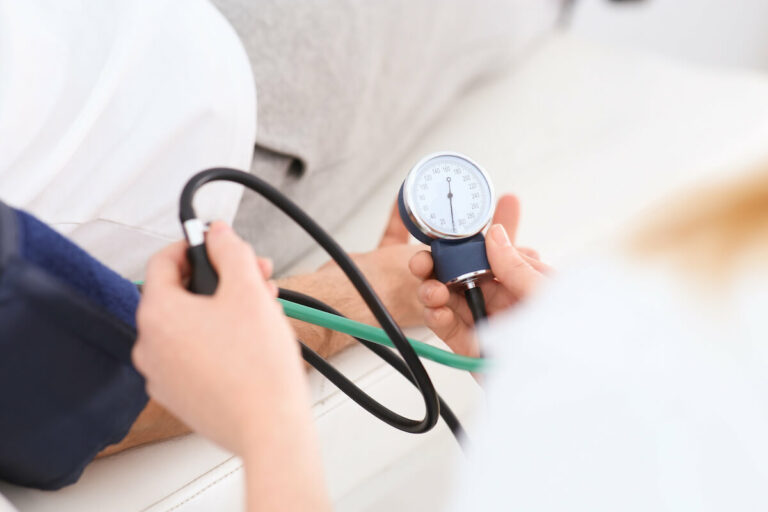 Civitas Senior Living | Nurse taking someone blood pressure