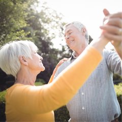 Civitas Senior Living | Senior couple dancing outside
