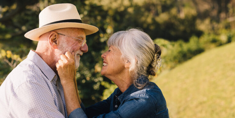Civitas Senior Living | Senior couple smiling at each other with love and affection