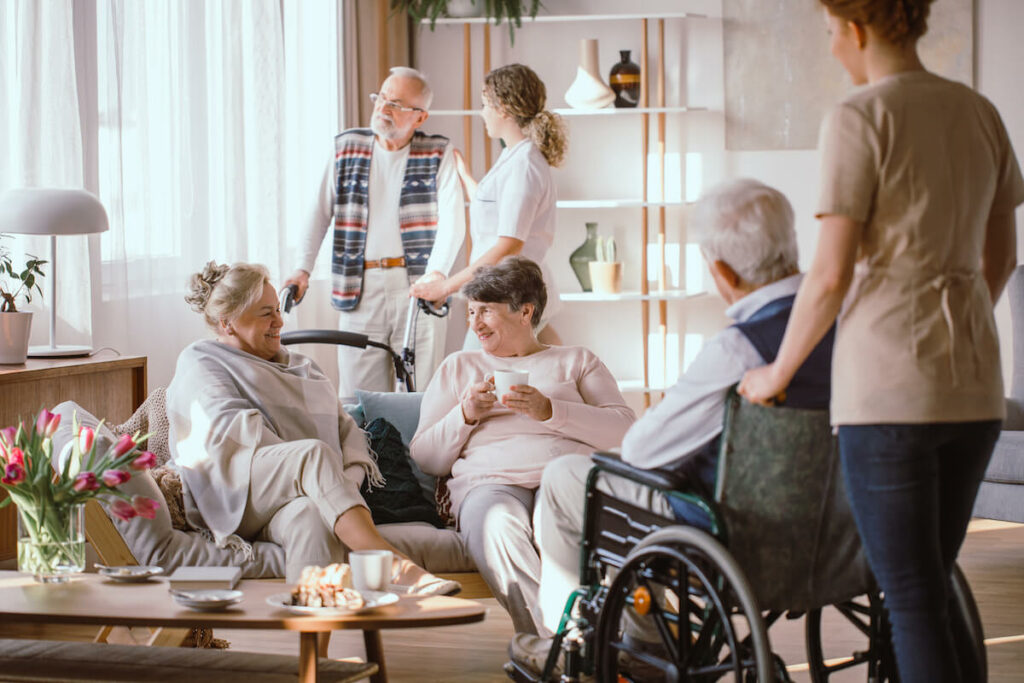 The Avenues of Park Forest | Seniors socializing in a community common area