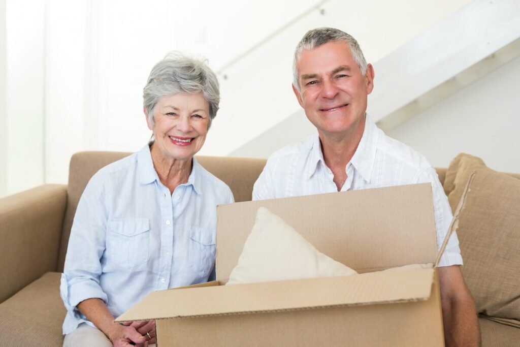 Civitas Senior Living | Senior couple packing moving boxes