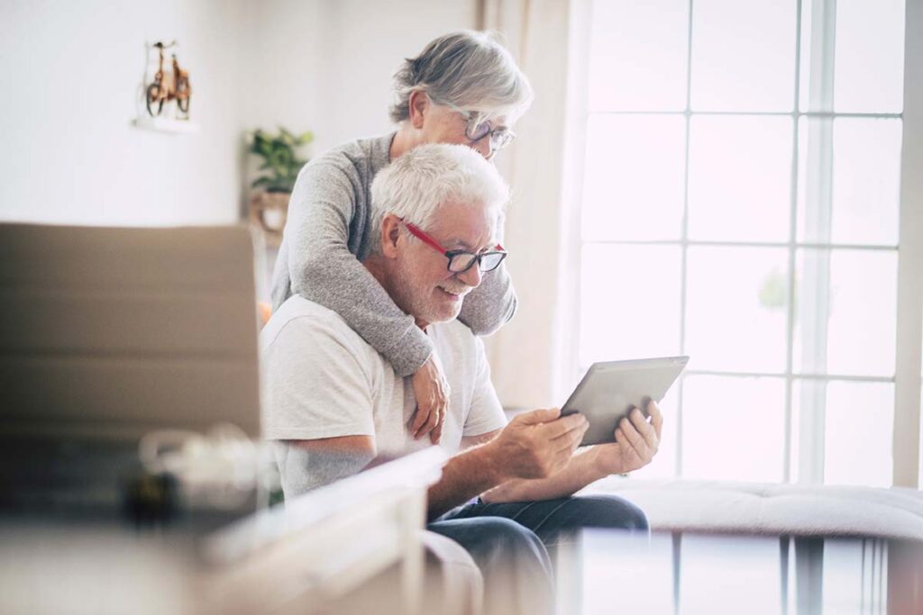 Tech Ridge Oaks | Senior couple using a tablet together