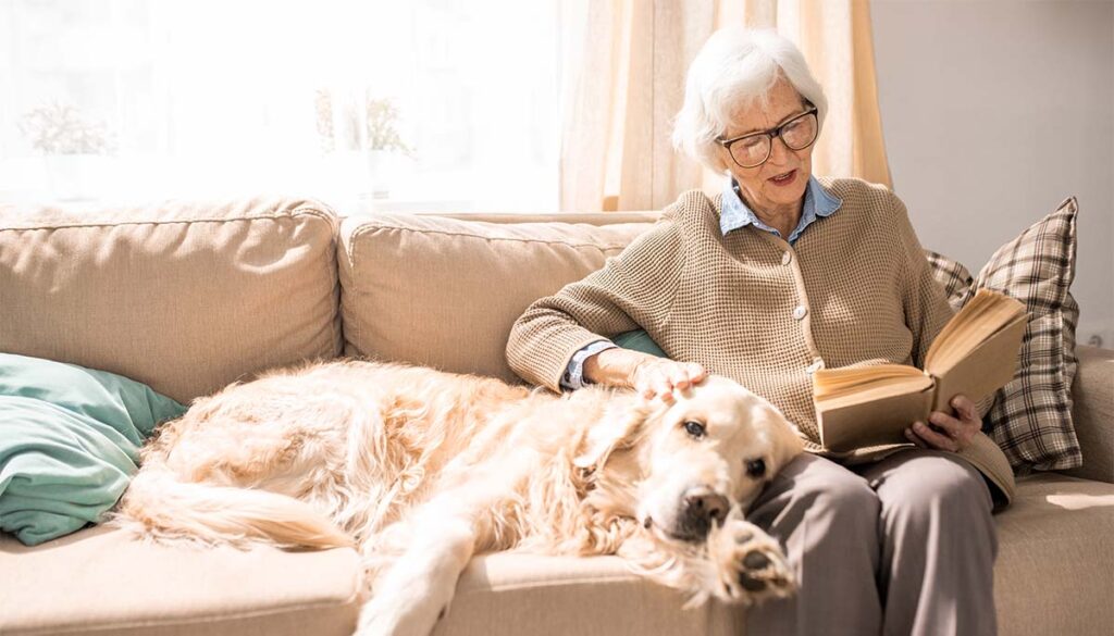 The Bluffs of Flagstaff | Senior woman and her dog in a pet-friendly community