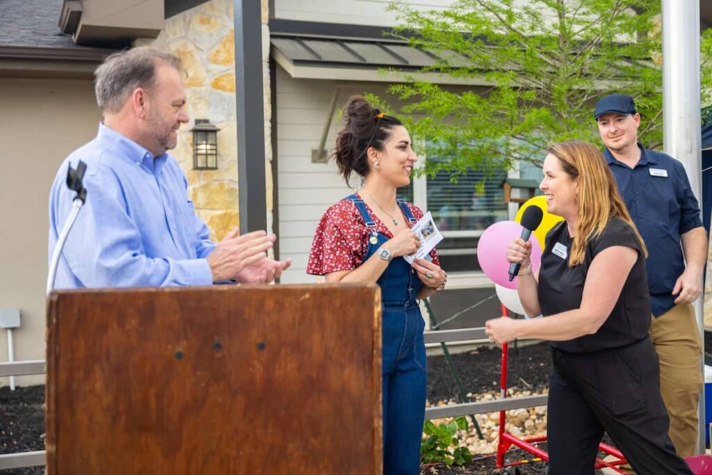 Civitas Senior Living | Wayne and Misti revealing a mural