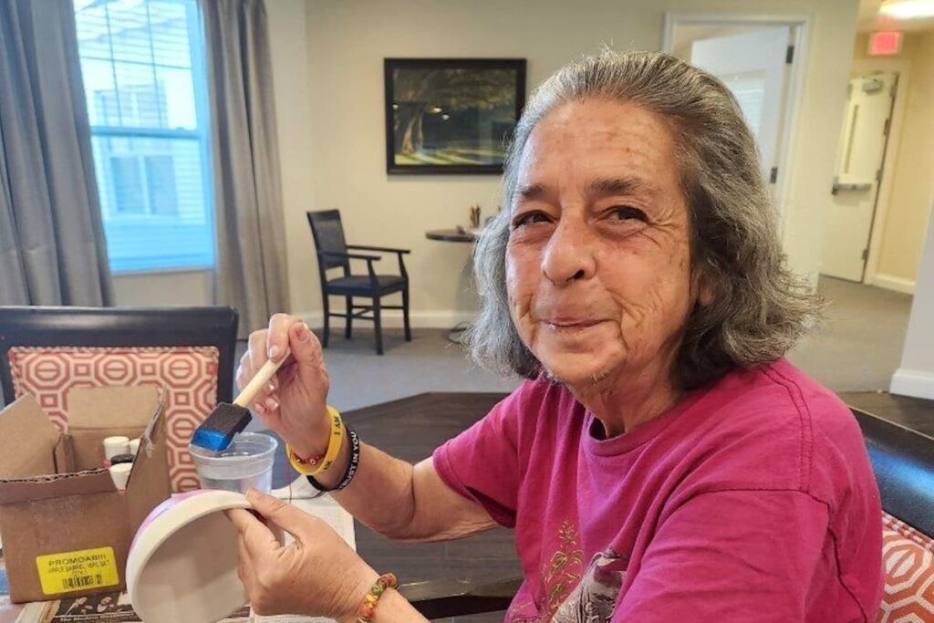 Harvest of Aledo | Senior painting a bowl