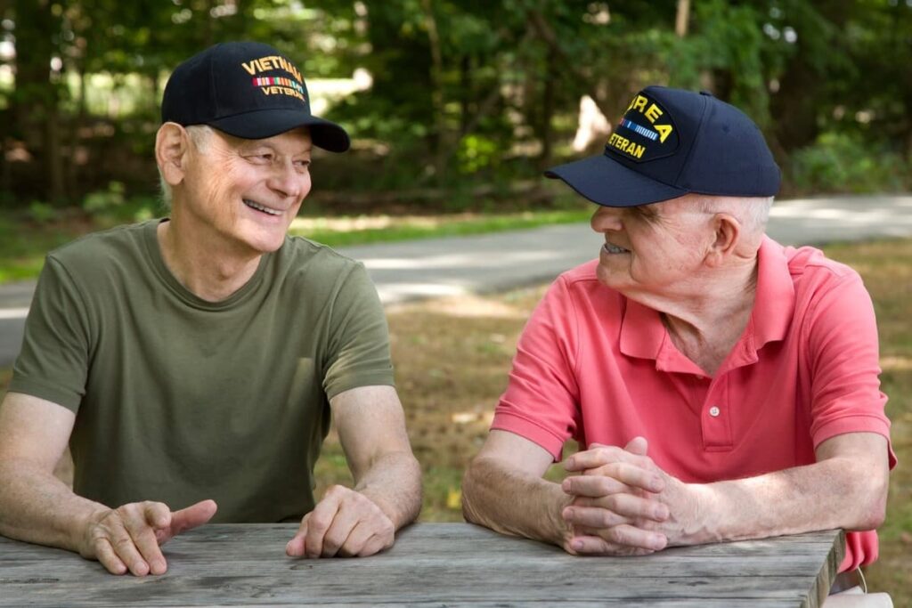 Harvest of Aledo | Veterans talking outside