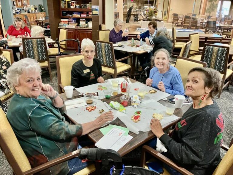 Four residents at a table