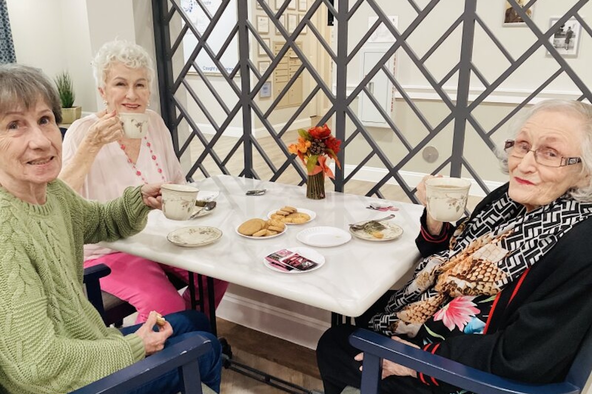 Stoncecreek of Copperfield | Three senior community residents having tea and cookies