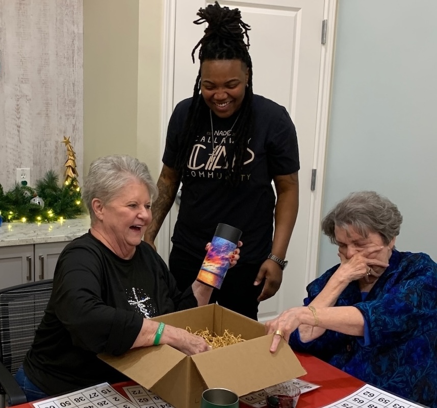 Civitas Senior Living | Seniors receiving gift boxes
