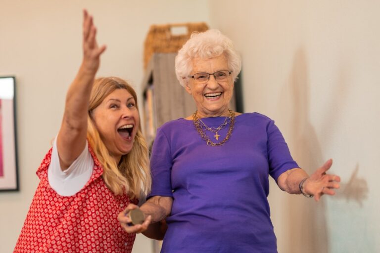Civitas Senior Living | Resident celebrating during a game