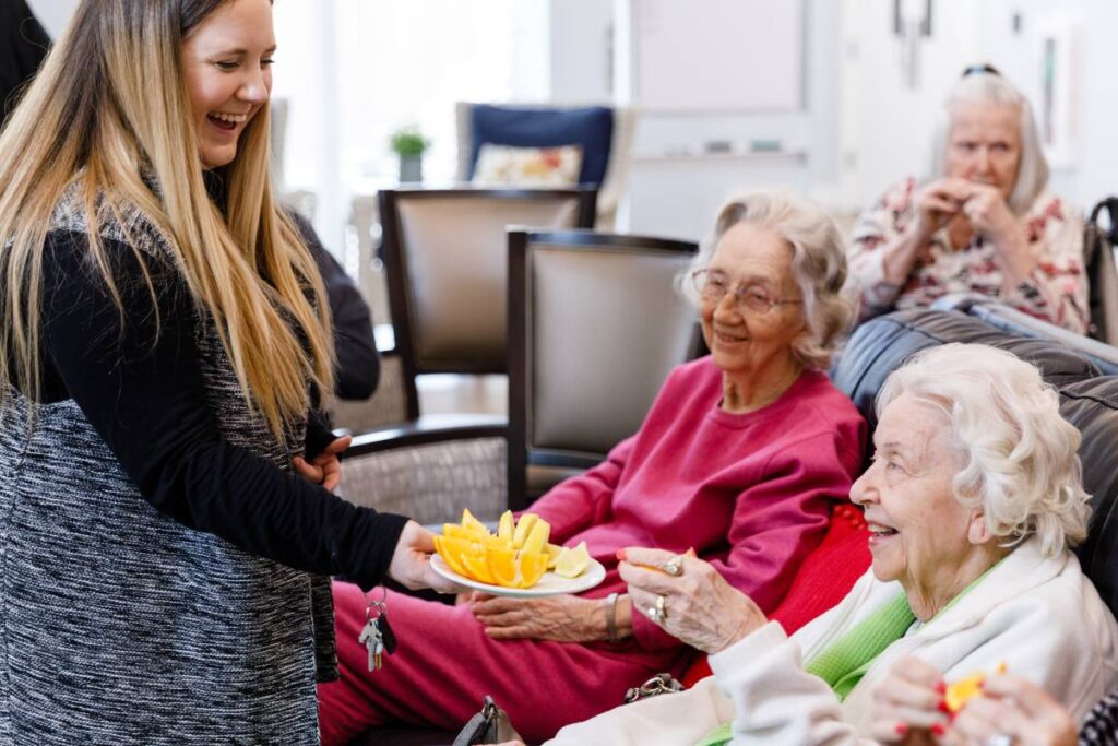 Residents at The Avenues of Fort Bend in Missouri City, TX, enjoy healthy snacks designed to support senior wellness and energy.