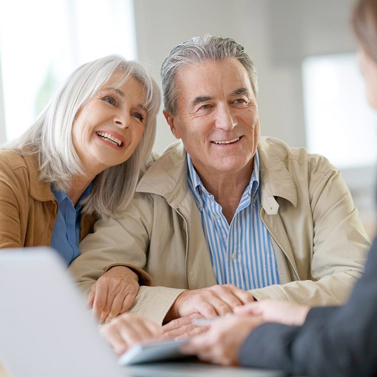 Civitas Senior Living | Senior couple meeting financial adviser for investment
