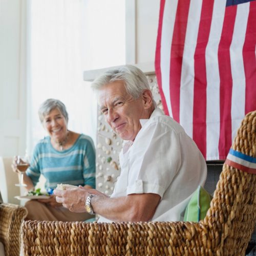 The Brooks of Cibolo | Senior couple with American flag