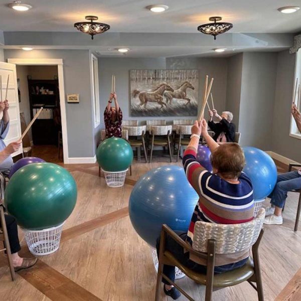 Civitas | Seniors participating in drum exercise to stay healthy and regulate blood pressure