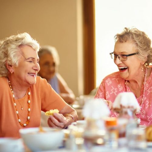Civitas Senior Living | Seniors laughing at lunch