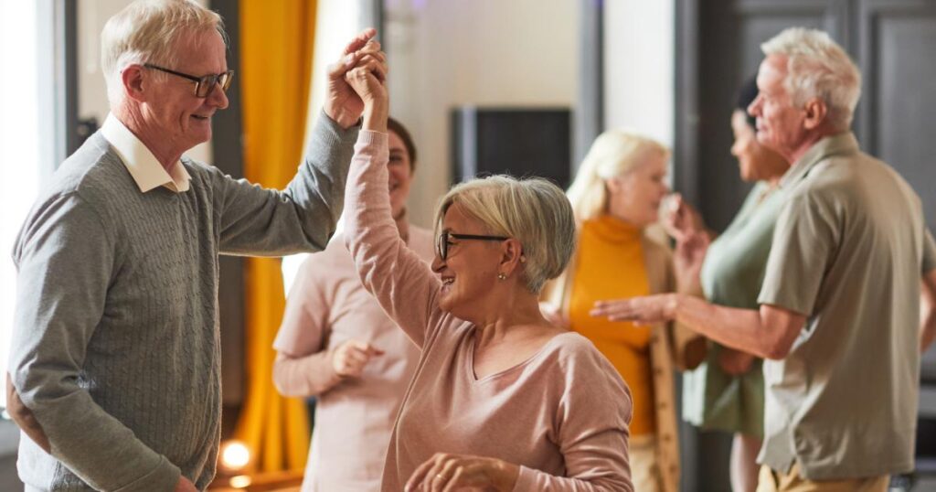 Seniors dancing and enjoying community