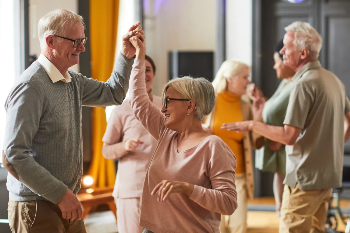 Seniors dancing and enjoying community