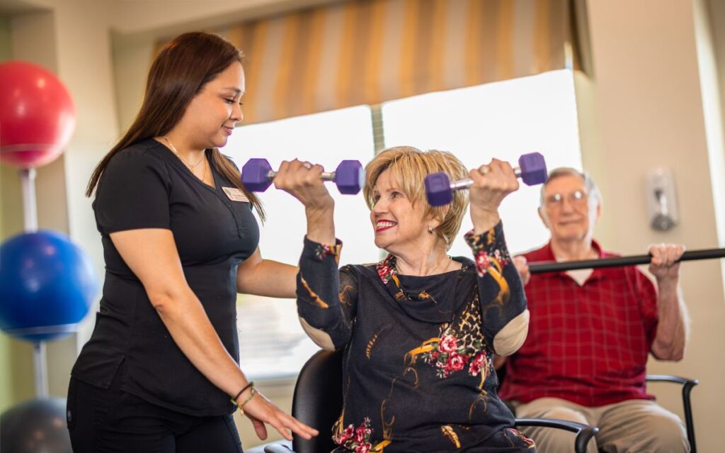Senior residents with dementia at The Bluffs of Flagstaff show how exercise supports their strength, balance, and cognitive wellness.