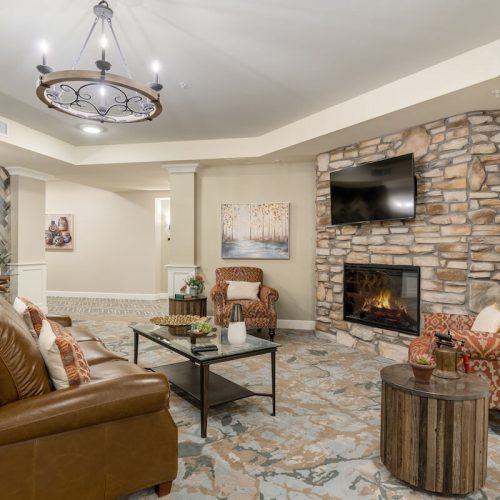 The Bluffs of Flagstaff | Common area with a fireplace