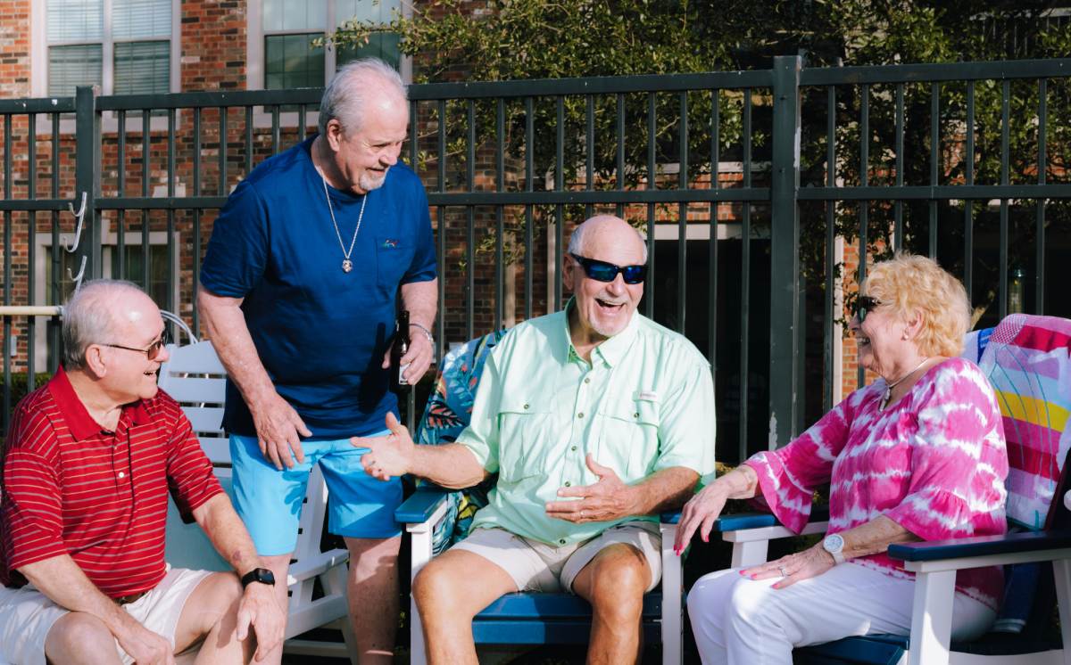 Civitas Senior Living | Seniors talking around the pool