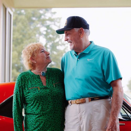 The Hamptons of Tyler | Happy senior couple entering the community